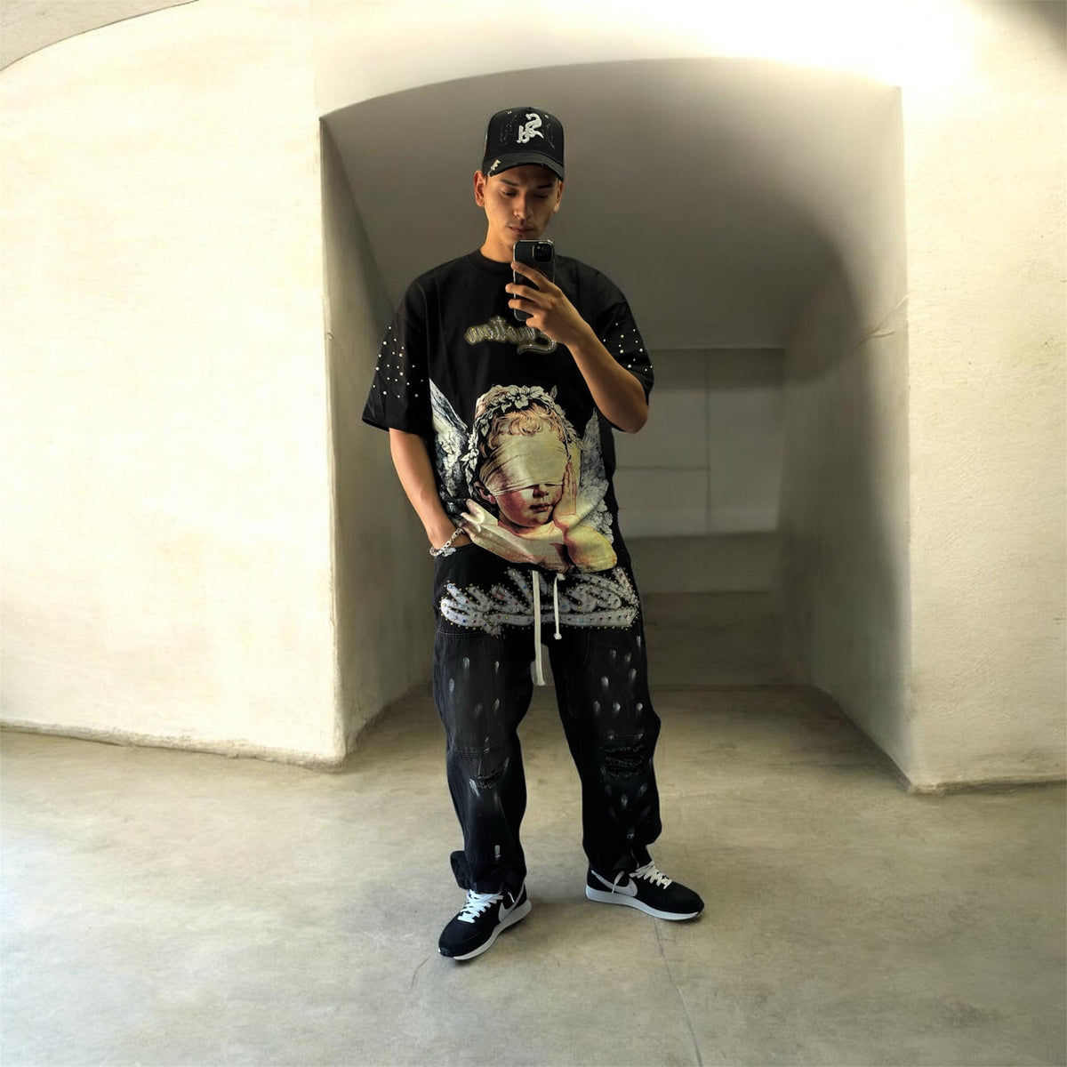 Mixed Emotion Angel Graphic Tee – Black
$80.00
Size XL · 1 unit available