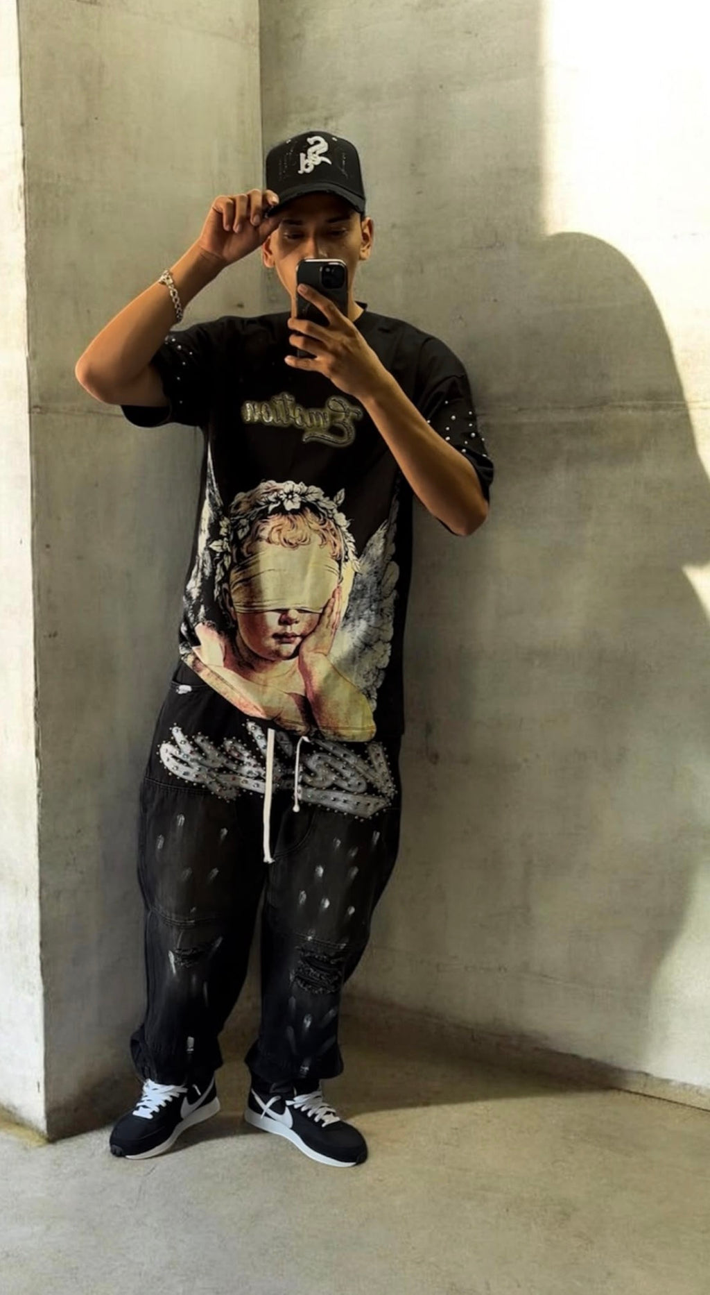 Mixed Emotion Angel Graphic Tee – Black
$80.00
Size XL · 1 unit available
